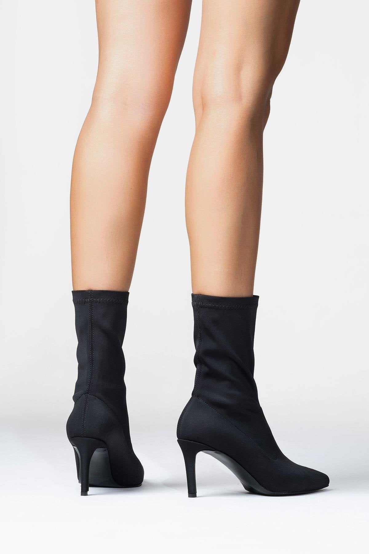 Thalin - Black Stretch Pointed Toe Slim Heel Boot (Women)