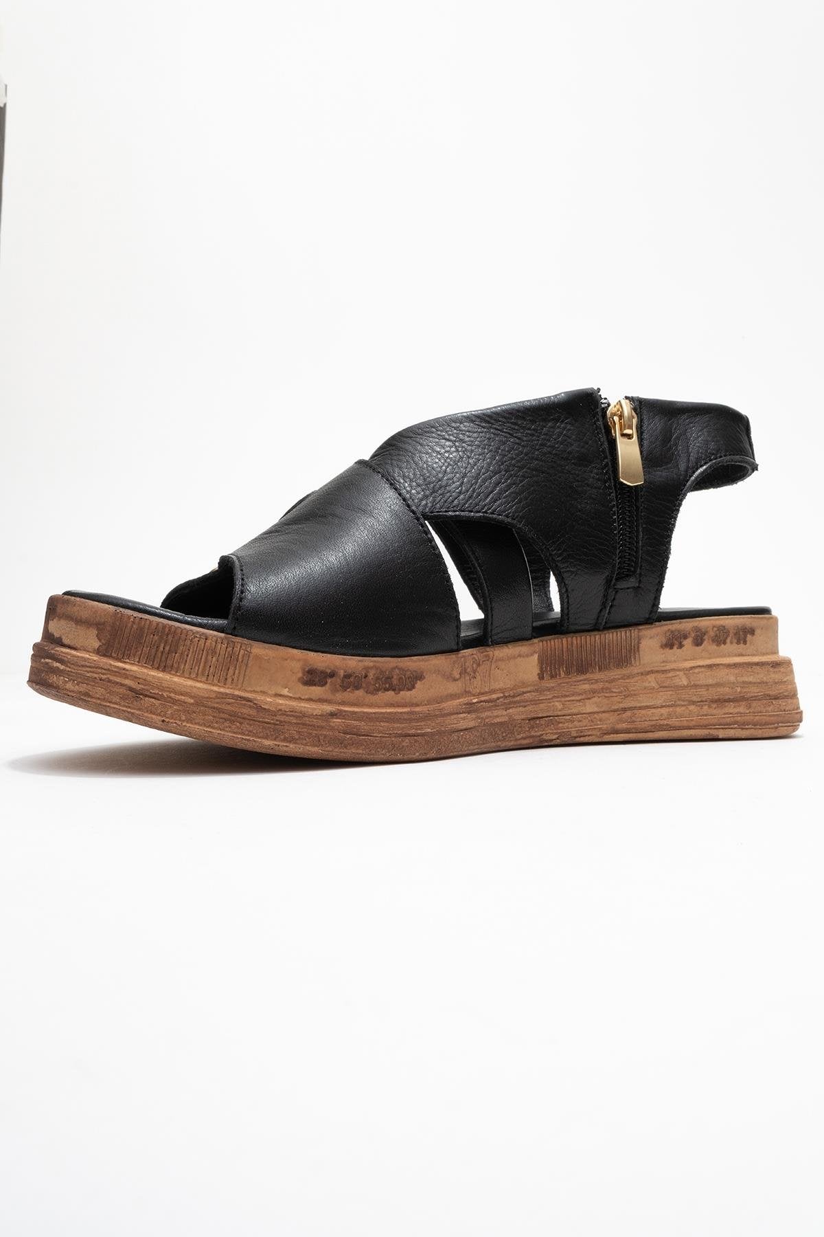 Levine Black Leather Buckled Side-Zip Sandal (Women)