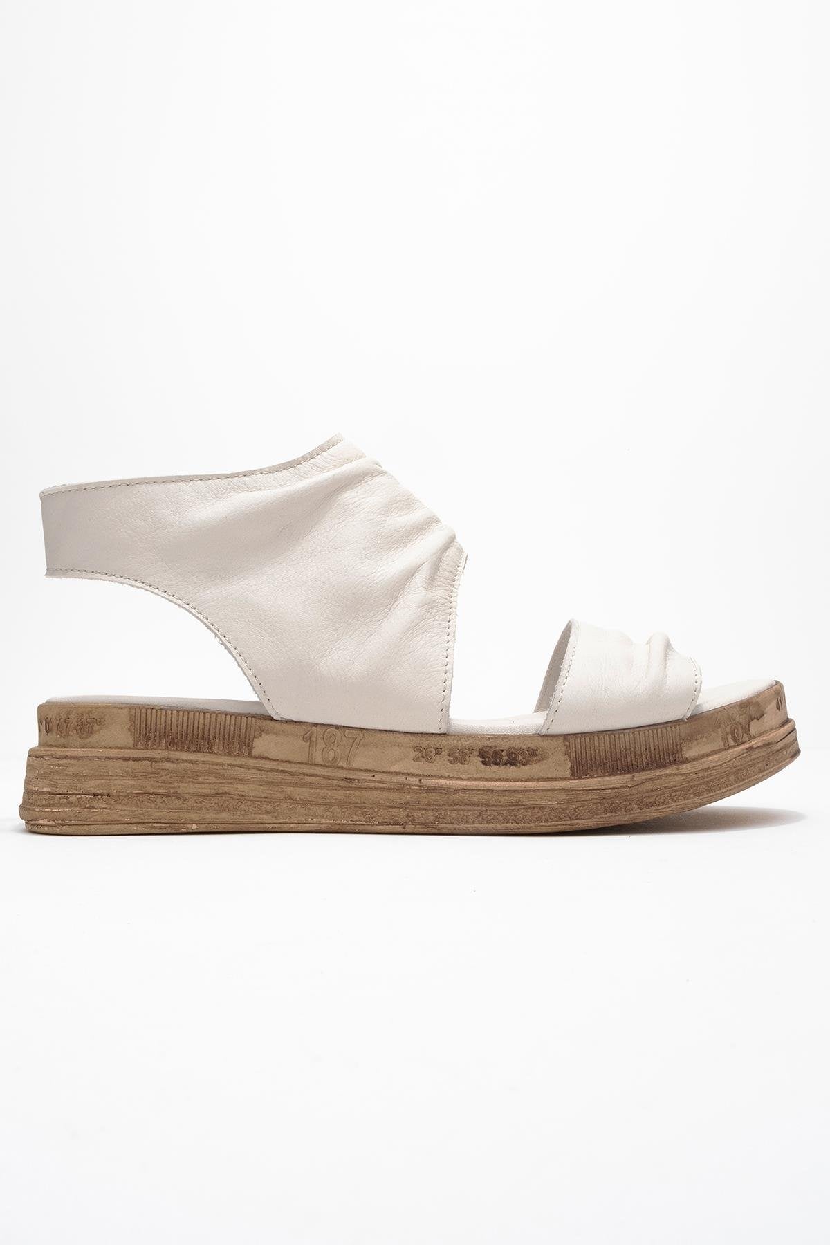 Lunas Cream Leather Side‑Zip Flat Heel Sandal (Women)