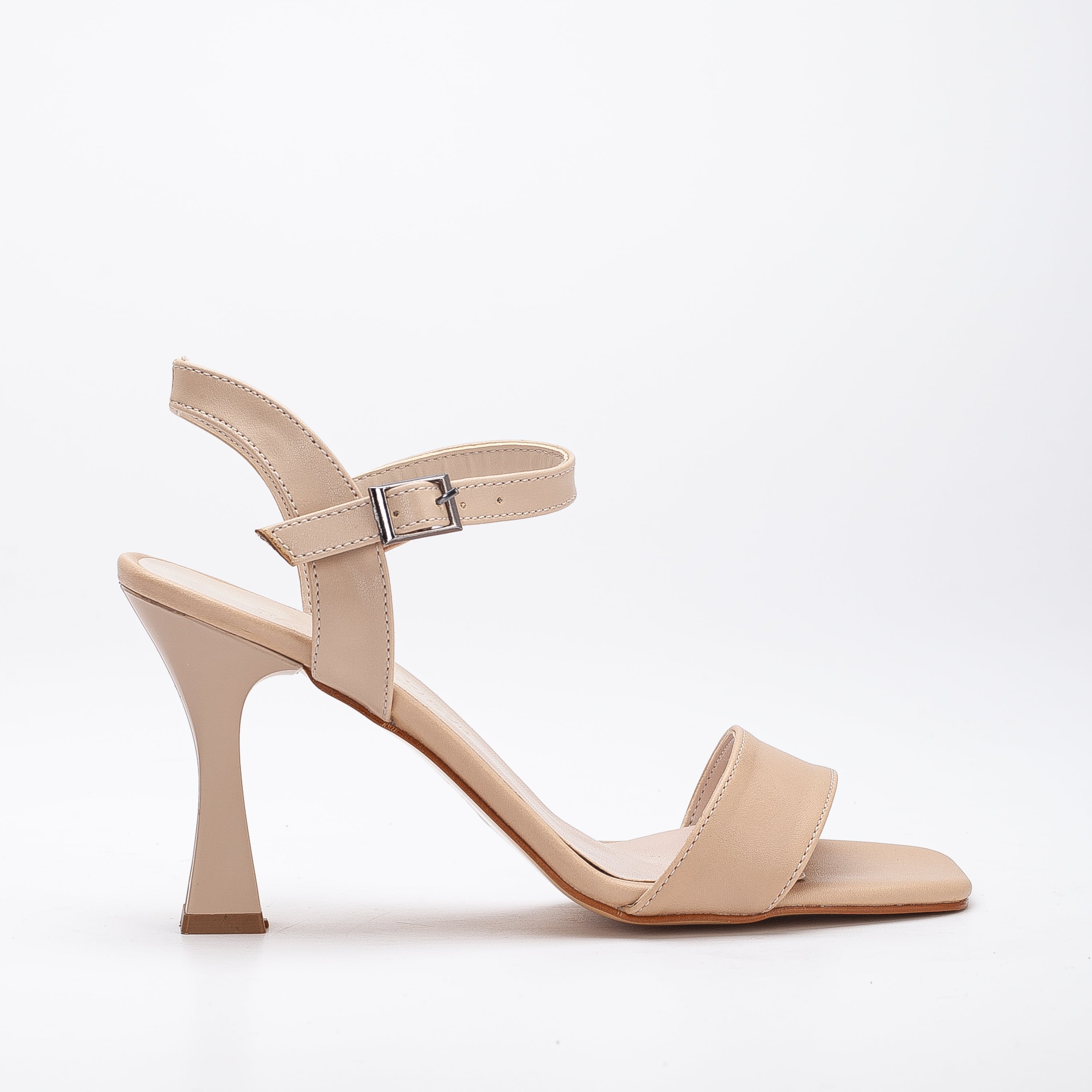 Beige low heel sandals, Low heel sandals in beige, Stylish beige low heel shoes, Chic low heel sandals, Trendy beige low heel footwear, Fashionable low heel sandals, Elegant beige low heel shoes, Classic low heel sandals, Comfortable beige low heel footwear, Beige low heel sandals for women.