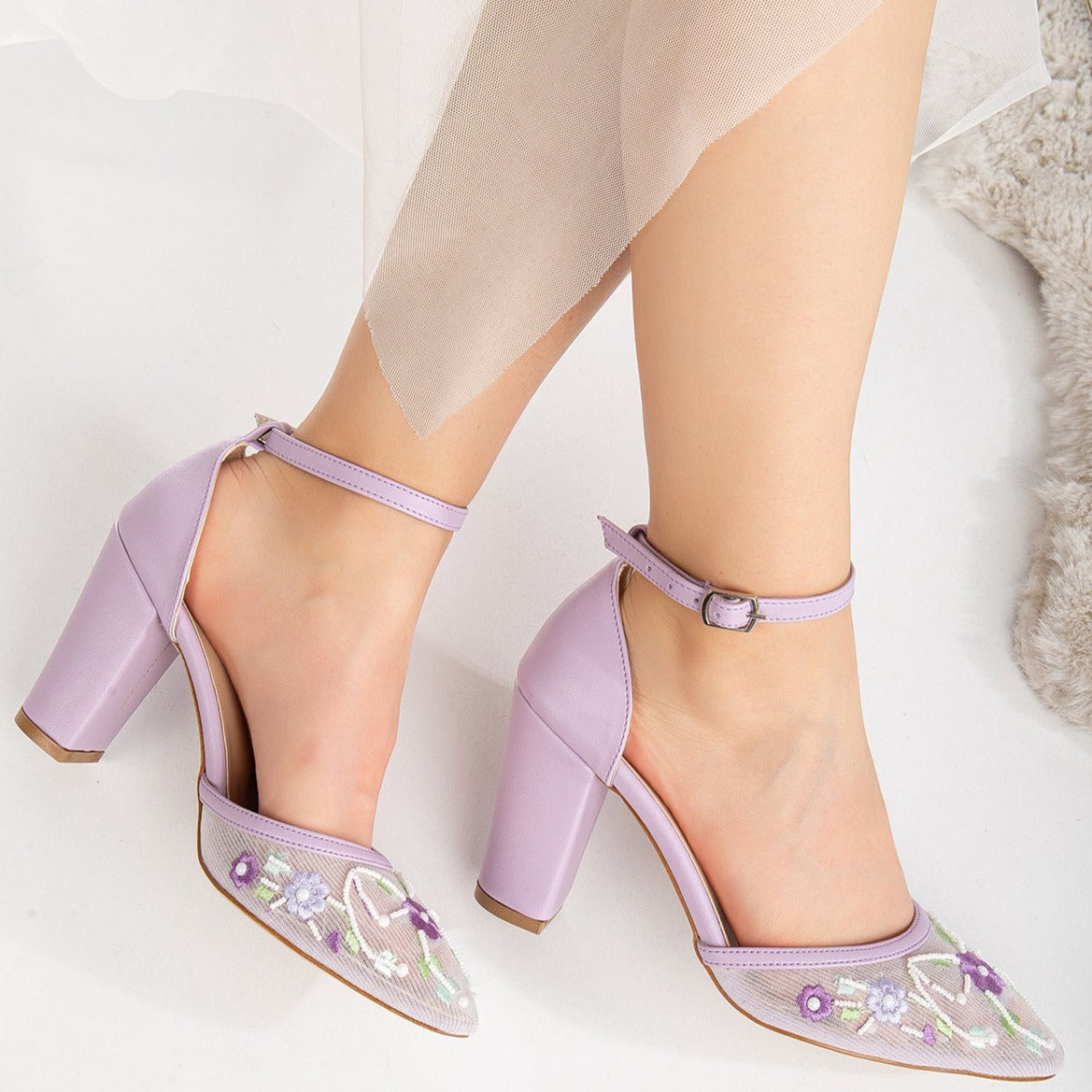 Lavender embroidered high heels, Embroidered lavender heels, Lavender floral embroidered heels, Lavender embellished high heels, Lavender heels with intricate embroidery, Lavender embroidered stilettos, Lavender embroidered pumps, Lavender high heels with delicate embroidery, Lavender embroidered wedding heels, Lavender embroidered bridal shoes.