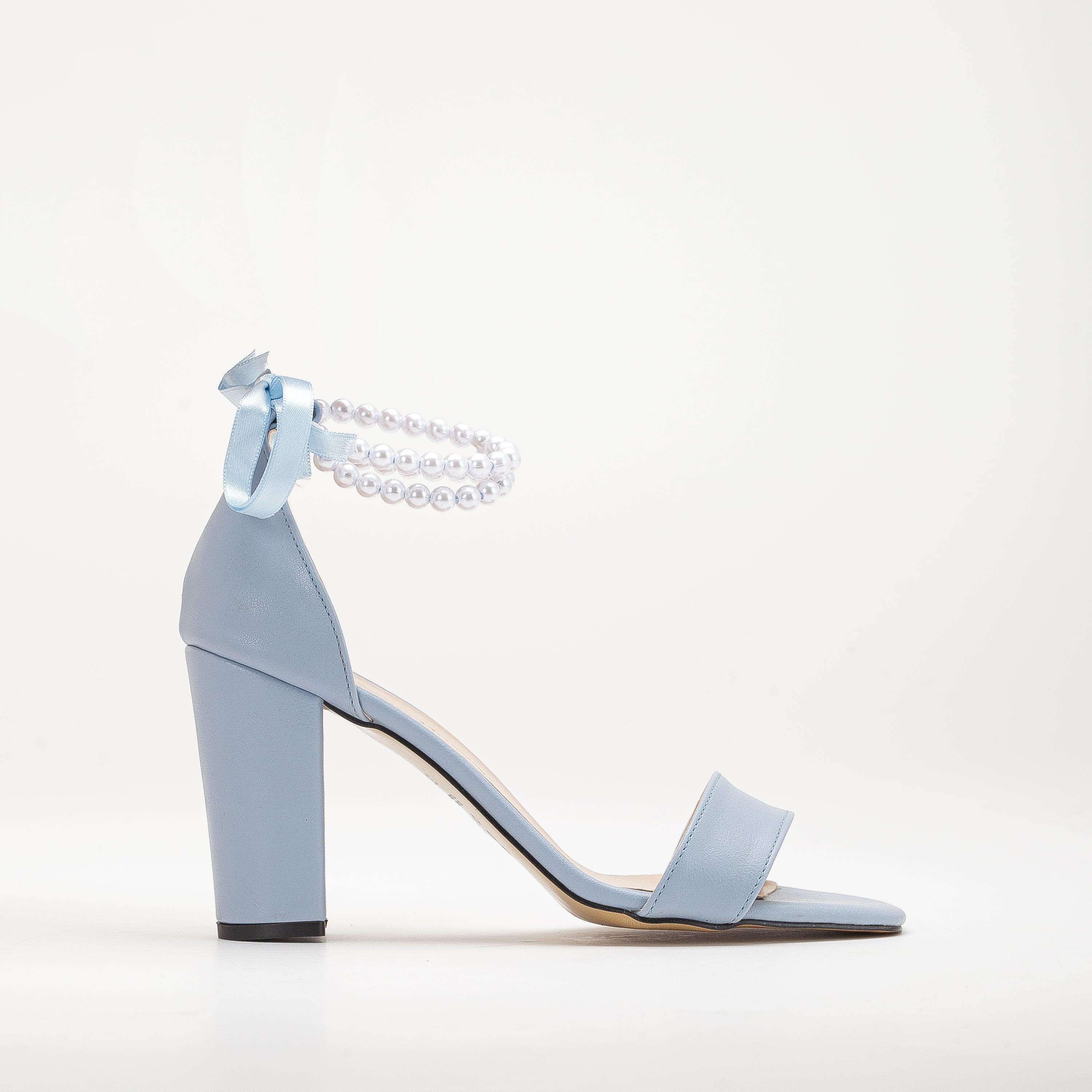 Light blue sandals, Low-heeled blue footwear, Sky blue wedding sandals, Casual blue heels, Short-heeled blue sandals, Chic light blue footwear, Comfortable bridal sandals, Stylish low-heeled shoes, Trendy blue wedding footwear, Fashionable light blue heels